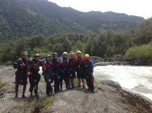The whole group checks out Pescador, the biggest rapid of the weekend on the Rio Trancura